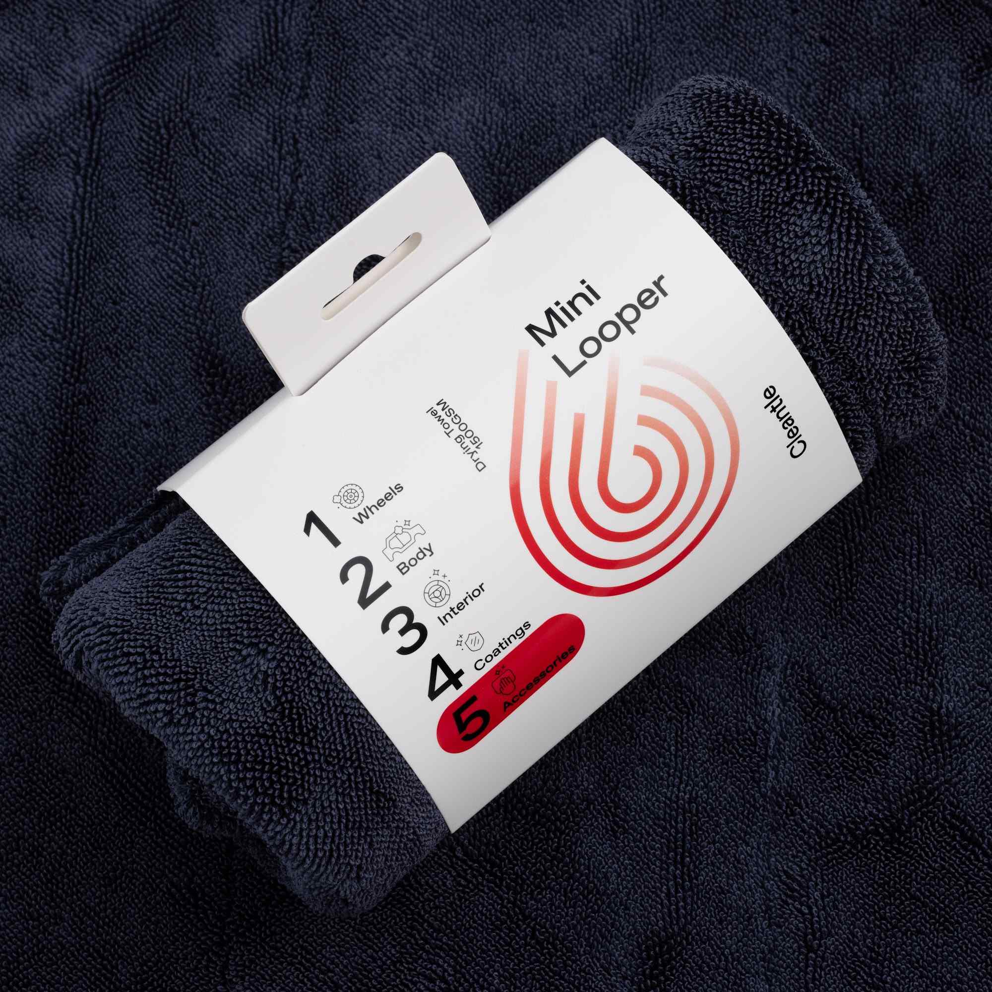 Cleantle Mini Looper w opakowaniu na tle ręcznika z mikrofibry